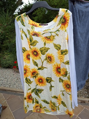 Unique tunic with - , pretty